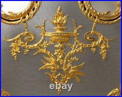 Antique French bronze fireplace set. France. Putti chenet, screen, tool set