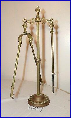 Antique ornate two piece brass cast iron fireplace tool set poker grabber