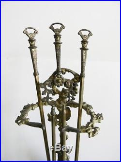 Cast French brass fireplace tool set with dog and hunting motif