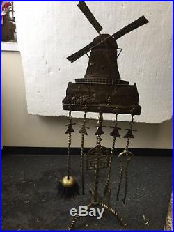 Early 20th C. Bronze fireplace tool set with rotating windmill
