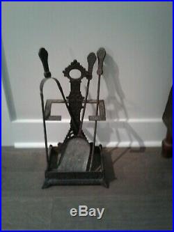 Early Victorian iron fireplace tool set