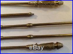 Set of antique cast brass fireplace tools