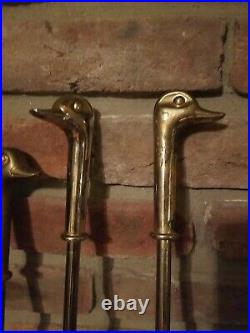 Vintage Brass Fireplace Tool Set with Duck Head Handles on the 4 Tools