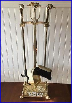 Vintage fireplace tool set. Solid brass with duck head handles. Complete set
